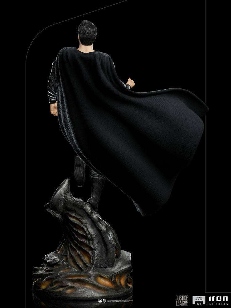 Back view of Iron Studios 1/4 scale Superman Black Suit statue from Zack Snyder's Justice League on a rocky base.