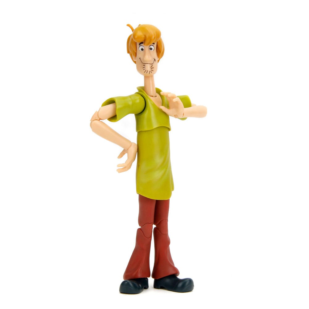 Jada Toys 15 cm Shaggy action figure in a green V-neck shirt and brown pants, shown from a front-facing standing view.
