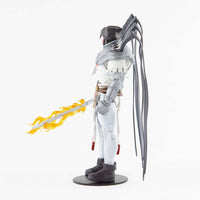 Side view of McFarlane DC Multiverse Azrael Suit of Sorrows figure with a flaming sword and long back cape attachments.