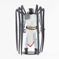 Back view of McFarlane DC Multiverse Azrael Suit of Sorrows figure with large black wings and white armored suit.