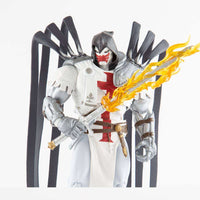 McFarlane DC Multiverse Azrael Suit of Sorrows figure in white armor with a flaming sword and black cape back-piece.