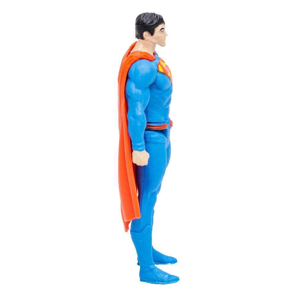 Side view of an 8 cm McFarlane DC Page Punchers Superman Rebirth action figure in a blue suit with a red cape.