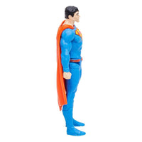 Side view of an 8 cm McFarlane DC Page Punchers Superman Rebirth action figure in a blue suit with a red cape.