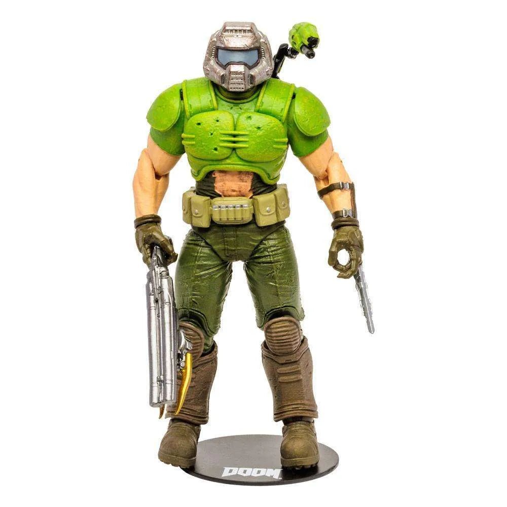McFarlane Doom Eternal Classic Doom Slayer action figure in green armor with a silver helmet and weapon, front view.