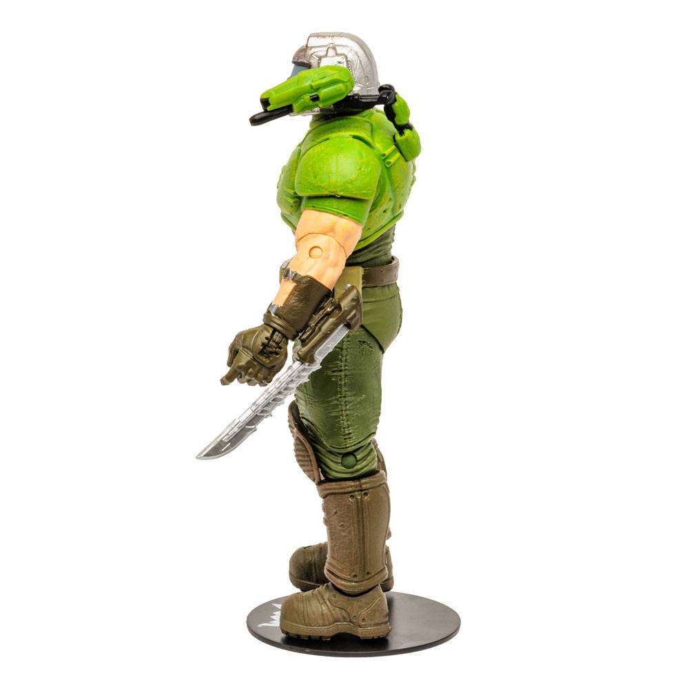 Side view of a 18 cm McFarlane Doom Eternal Classic Doom Slayer action figure wearing green armor and a silver helmet.