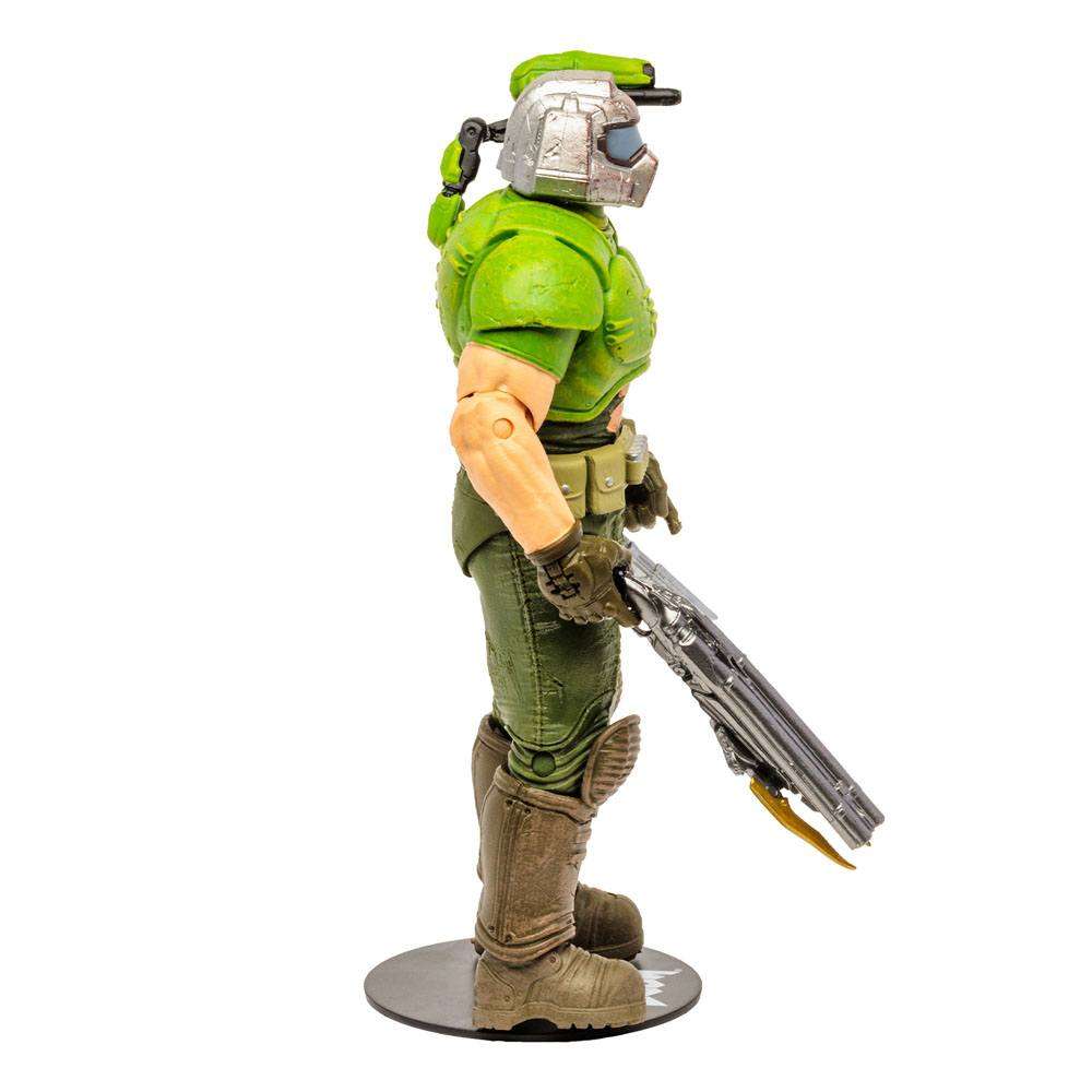 Side view of the 18 cm McFarlane Doom Eternal Classic Doom Slayer action figure holding a shotgun on a black base.