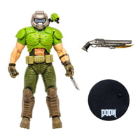 McFarlane Doom Eternal Classic Doom Slayer action figure with green armor, shotgun, and branded display stand.