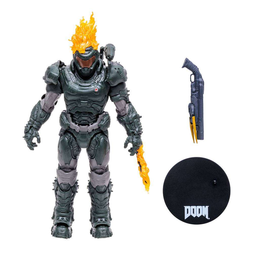 McFarlane Doom Eternal Ember Skin Slayer action figure with flaming head, weapon, and Doom logo display base.