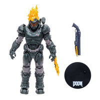 McFarlane Doom Eternal Ember Skin Slayer action figure with flaming head, weapon, and Doom logo display base.