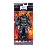 McFarlane Doom Eternal Doom Slayer Ember Skin action figure in window box packaging with fiery helmet detail.