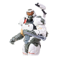 McFarlane Doom Eternal Doom Slayer action figure in white armor, featuring a shoulder-mounted cannon and arm blade.