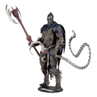 McFarlane Raven Spawn 18 cm action figure holding a large axe and chain, featuring a skull mask and dark textured armor.