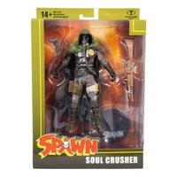 McFarlane Spawn Soul Crusher 18 cm action figure in packaging with green hooded cape, tactical gear, and rifle accessories.