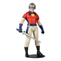 McFarlane Suicide Squad Peacemaker 18 cm action figure in a front view, wearing a chrome helmet and holding a sword.