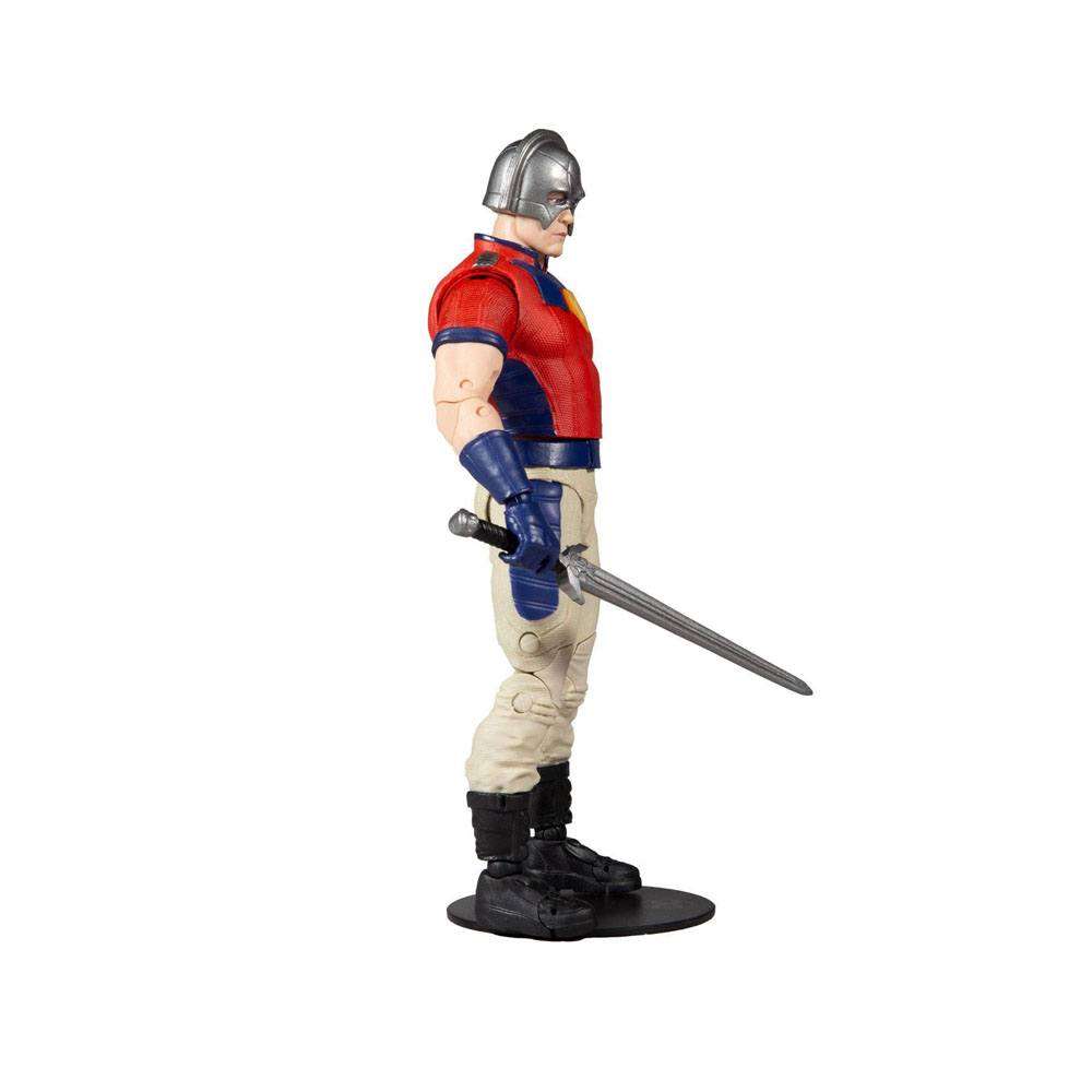 Side view of 18 cm McFarlane Peacemaker action figure in red, blue, and cream uniform with a silver helmet and sword.