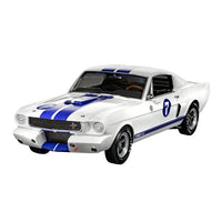 Front three-quarter view of a white Revell 1966 Shelby GT350R model kit with blue racing stripes and number 7 decals.