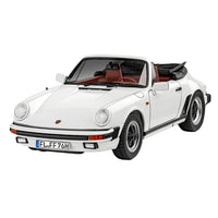 White Revell Porsche 911 G-Model Cabriolet model kit with a red interior, shown from a front three-quarter angle.