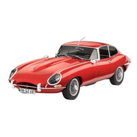 Front three-quarter view of a red Revell Jaguar E-Type Coupé 1:24 scale model kit with detailed wire wheels.
