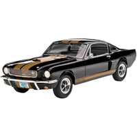 Revell Shelby Mustang GT350 model kit in black with gold racing stripes and Hertz branding, shown from a front angle.