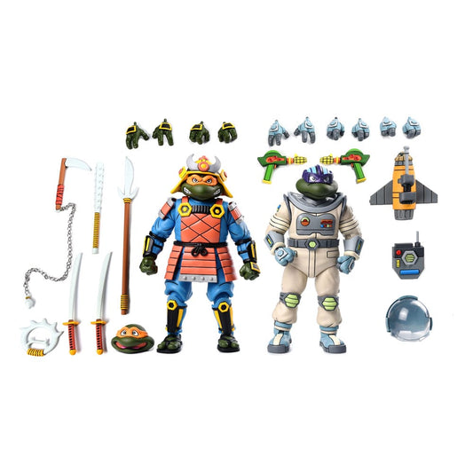 Two action figures with accessories on a white background